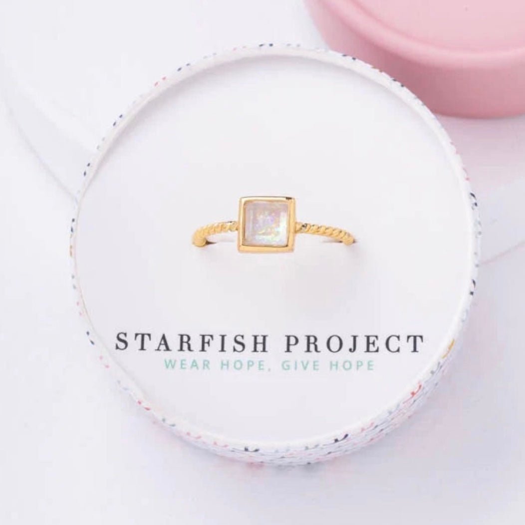 Bright Ring in Glistening White and Gold