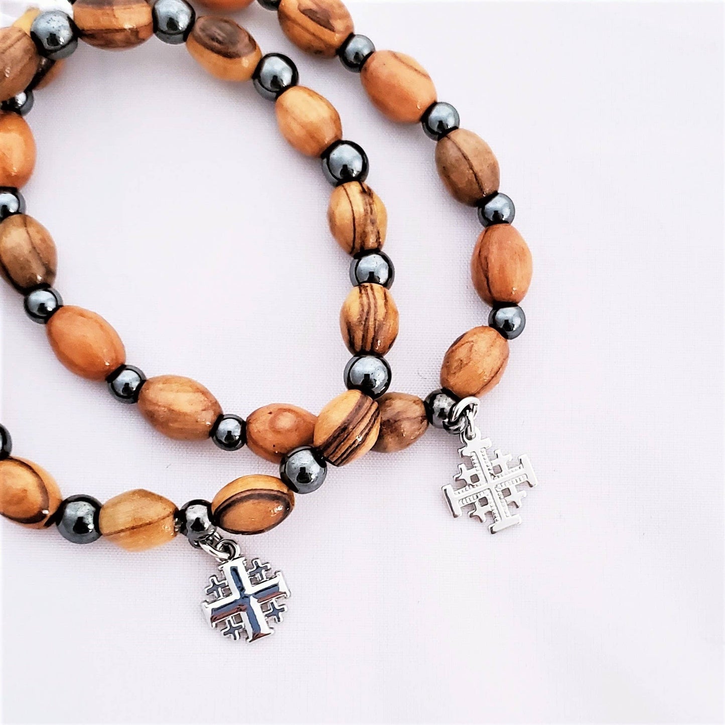 Olive Wood and Hematite Bead Bracelet with Jerusalem Cross - Recetas Fair Trade