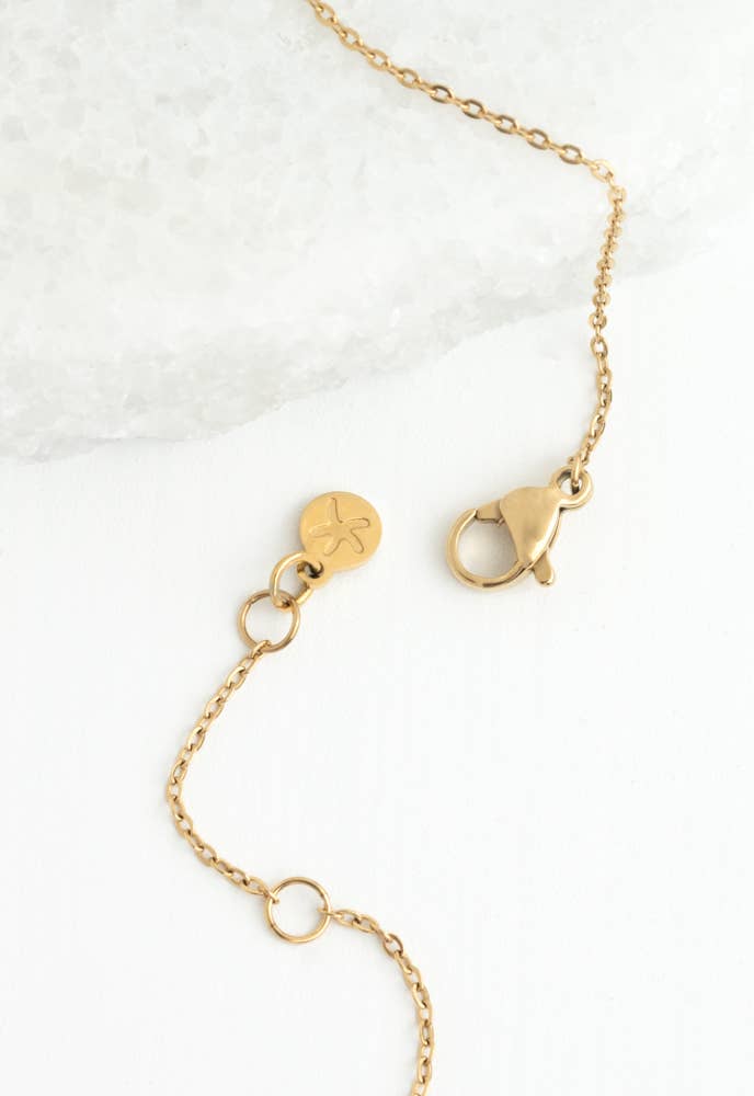 Radiant Cross Necklace in Gold - Recetas Fair Trade