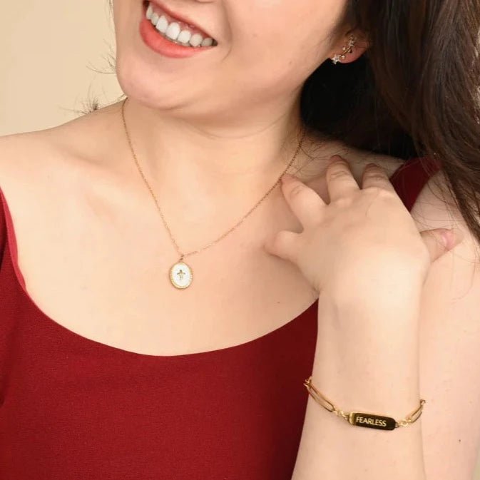 Shine Bright Cross Pendant in Ivory - Recetas Fair Trade