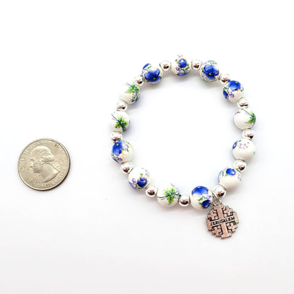 Blue Ceramic Bead Stretch Bracelet with Jerusalem Cross - Recetas Fair Trade