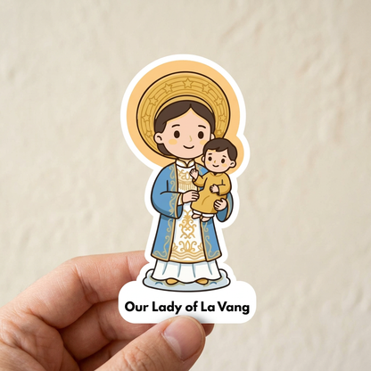 Our Lady of La Vang sticker held between fingers