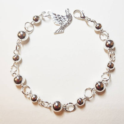 Silver Beaded Motif Charm Bracelets - Recetas Fair Trade